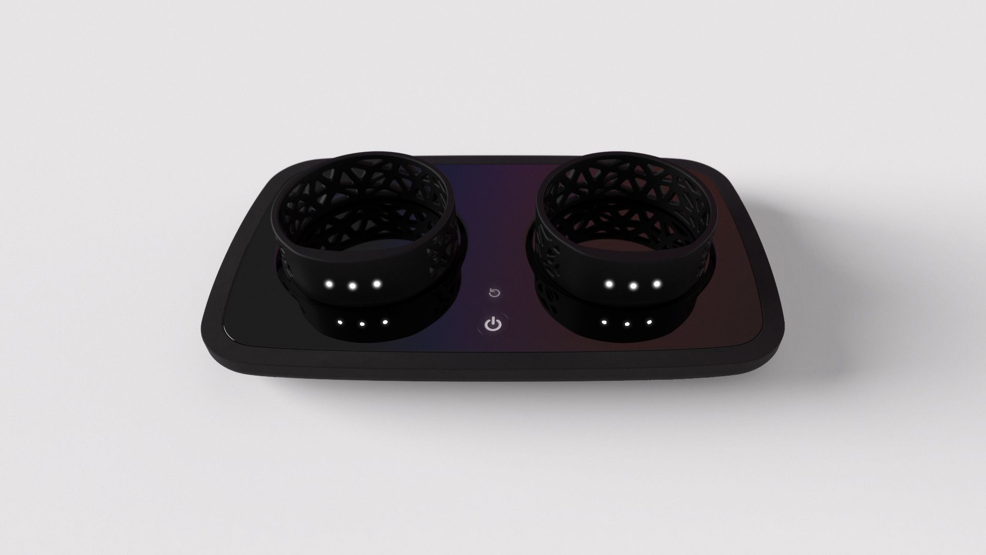 The two tracking rings and their charging case shown together on a plain white background, product-shot style.
